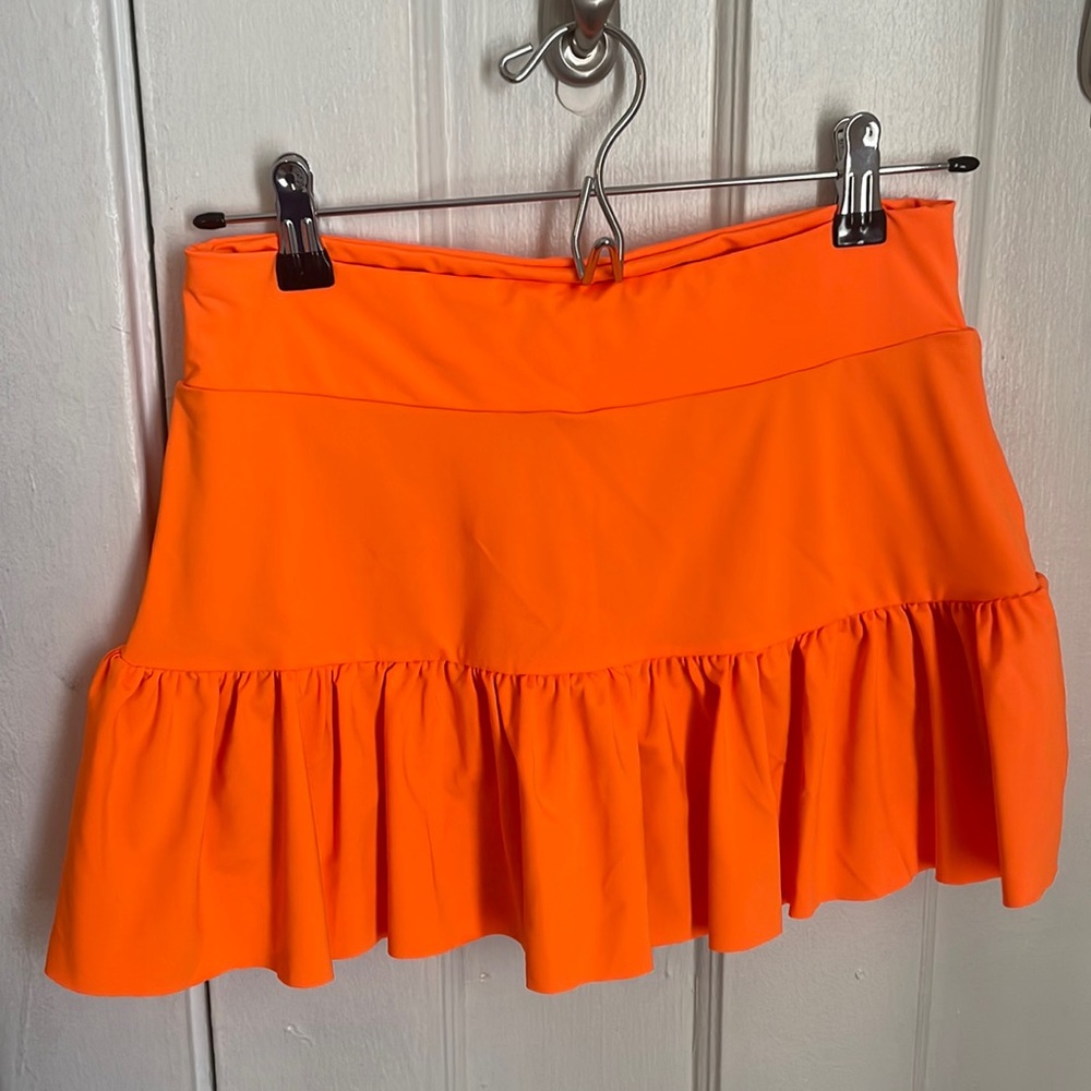 Neon orange tennis skirt